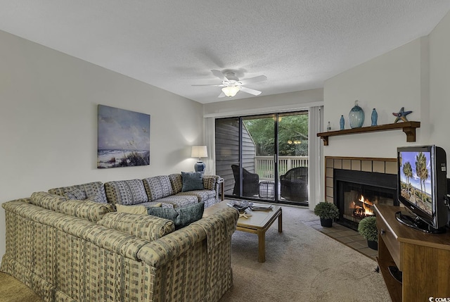 118 Hartland Dr Unit 12-C, Myrtle Beach, SC 29572 - carpeted living room featuring a fireplace, a ceiling fan, and a textured ceiling