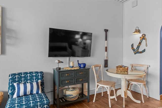 6803 N Ocean Blvd Unit 203, Myrtle Beach, SC 29572 - living area featuring baseboards and wood finished floors