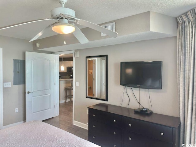 3500 N Ocean Blvd Unit 1203, North Myrtle Beach, SC 29582 - bedroom featuring electric panel and dark wood-style floors
