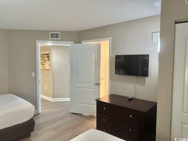 3500 N Ocean Blvd Unit 1203, North Myrtle Beach, SC 29582 - bedroom with light wood-type flooring and baseboards