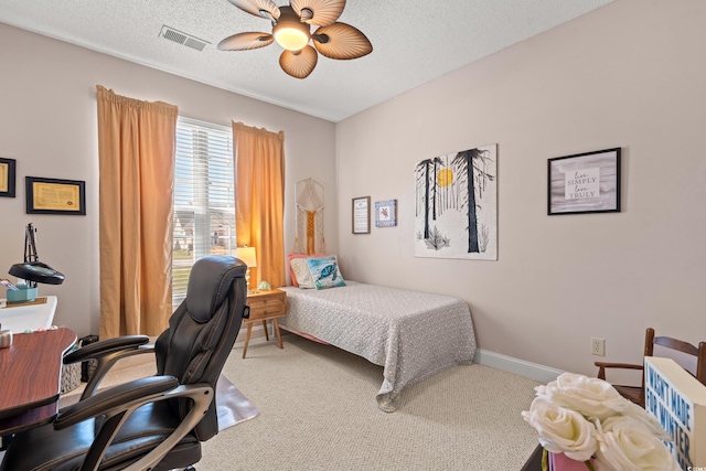 542 Sand Ridge Rd, Conway, SC 29526 - carpeted bedroom featuring a textured ceiling, a ceiling fan, and baseboards
