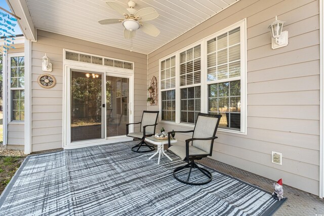 542 Sand Ridge Rd, Conway, SC 29526 - wooden porch featuring a ceiling fan