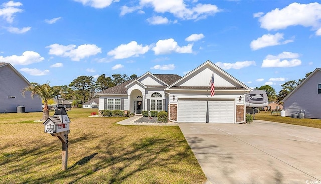 508 Loblolly Ln, Loris, SC 29569 - view of front of property with driveway, brick siding, a front yard, and a garage