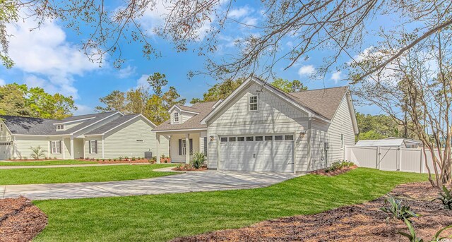 view of front of house featuring concrete driveway, a front yard, central AC unit, fence, and a shingled roof