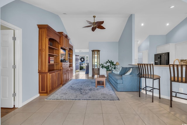 308 Dendy Ct, Myrtle Beach, SC 29579 - living room with a ceiling fan, high vaulted ceiling, light tile patterned flooring, and baseboards