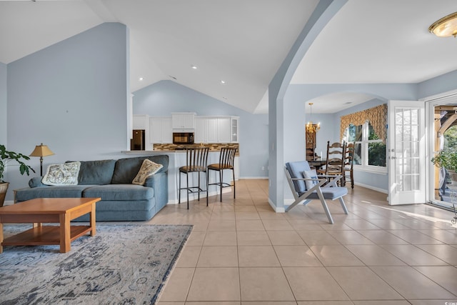 308 Dendy Ct, Myrtle Beach, SC 29579 - living area with vaulted ceiling, arched walkways, light tile patterned floors, and recessed lighting