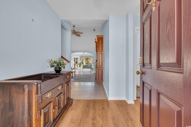 308 Dendy Ct, Myrtle Beach, SC 29579 - foyer featuring light wood finished floors, arched walkways, and baseboards