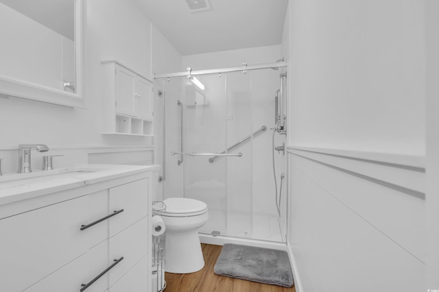 308 Dendy Ct, Myrtle Beach, SC 29579 - full bath featuring toilet, vanity, wood finished floors, and a shower stall