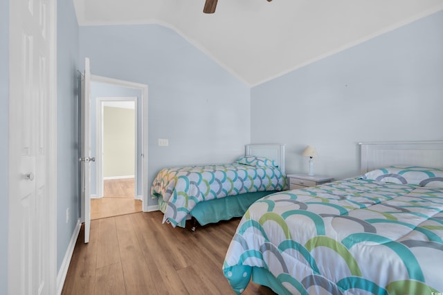 308 Dendy Ct, Myrtle Beach, SC 29579 - bedroom featuring vaulted ceiling, wood finished floors, ceiling fan, and baseboards