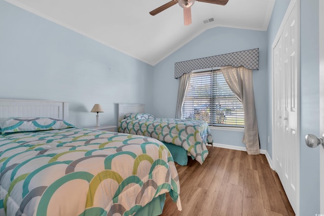 308 Dendy Ct, Myrtle Beach, SC 29579 - bedroom featuring lofted ceiling, a closet, wood finished floors, baseboards, and a ceiling fan