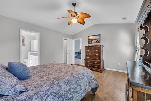 308 Dendy Ct, Myrtle Beach, SC 29579 - bedroom with wood finished floors, lofted ceiling, baseboards, connected bathroom, and a ceiling fan