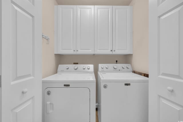 308 Dendy Ct, Myrtle Beach, SC 29579 - laundry area featuring washing machine and dryer and cabinet space