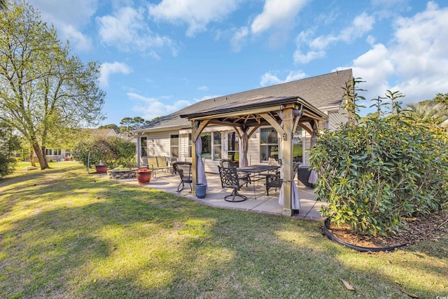 308 Dendy Ct, Myrtle Beach, SC 29579 - rear view of property featuring a gazebo, a lawn, roof with shingles, and a patio