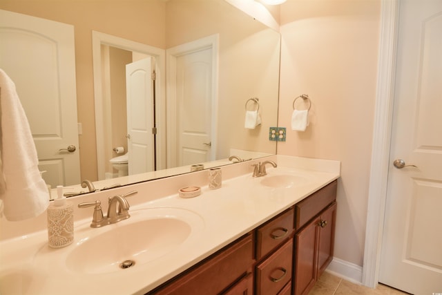 408 7th Ave S, North Myrtle Beach, SC 29582 - bathroom featuring double vanity and tile patterned floors