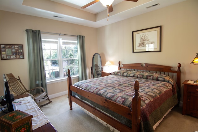 408 7th Ave S, North Myrtle Beach, SC 29582 - carpeted bedroom with a tray ceiling and ceiling fan