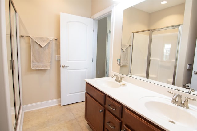 408 7th Ave S, North Myrtle Beach, SC 29582 - full bathroom featuring a stall shower, double vanity, and tile patterned flooring