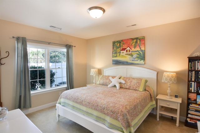 408 7th Ave S, North Myrtle Beach, SC 29582 - bedroom with light colored carpet and baseboards