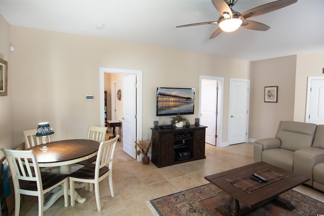408 7th Ave S, North Myrtle Beach, SC 29582 - living room featuring a ceiling fan and light tile patterned floors