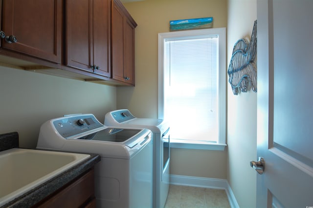 408 7th Ave S, North Myrtle Beach, SC 29582 - laundry area featuring separate washer and dryer and cabinet space