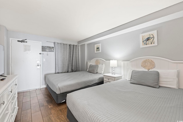 6804 Ocean Blvd N Unit 1529, Myrtle Beach, SC 29572 - bedroom with dark wood finished floors