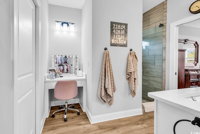 529 Oak Lawn Rd, Georgetown, SC 29440 - bathroom with a shower stall, vanity, baseboards, and wood finished floors