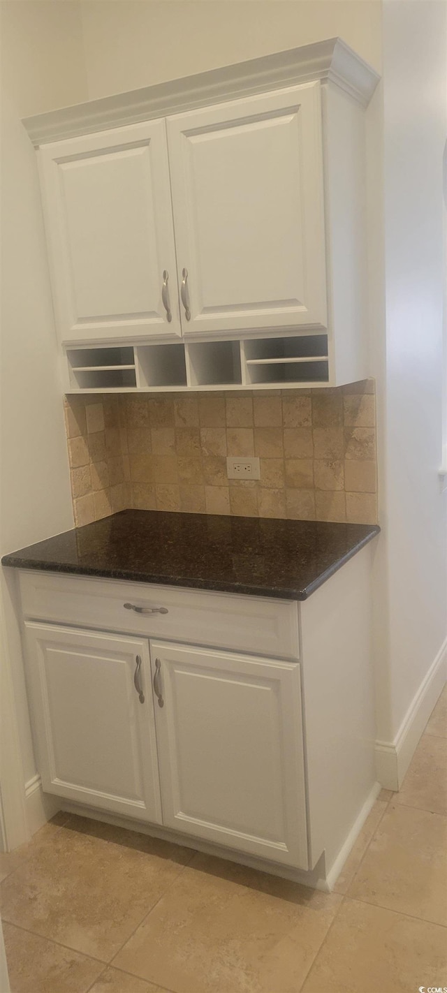 7268 Seville Dr, Myrtle Beach, SC 29572 - detailed view of decorative backsplash and baseboards