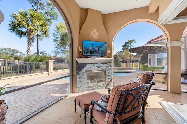 7268 Seville Dr, Myrtle Beach, SC 29572 - view of patio / terrace with an outdoor stone fireplace