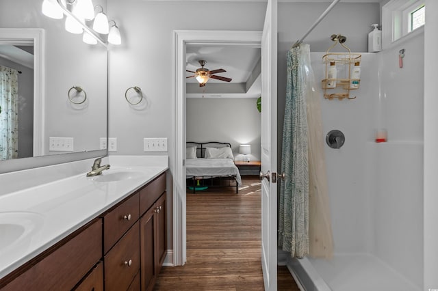 1524 Stilley Cir, Conway, SC 29526 - bathroom with a stall shower, a ceiling fan, wood finished floors, and ensuite bath