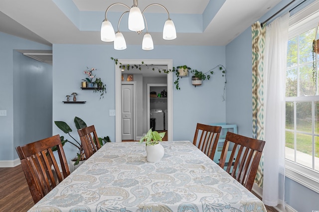 1524 Stilley Cir, Conway, SC 29526 - dining room featuring a chandelier, wood finished floors, and baseboards