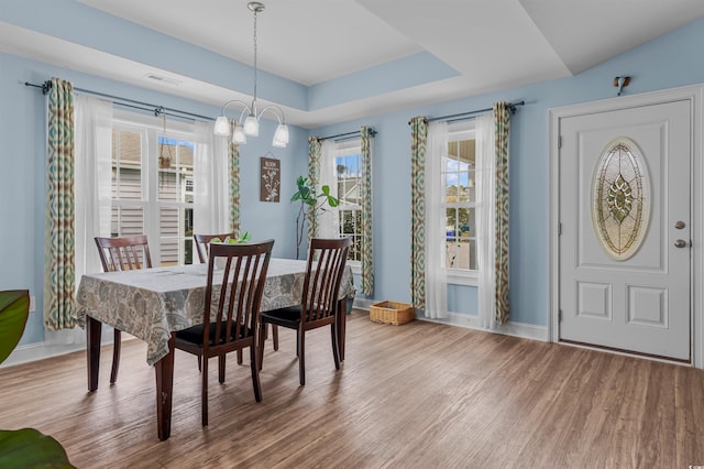1524 Stilley Cir, Conway, SC 29526 - dining room with wood finished floors, a chandelier, baseboards, and a raised ceiling