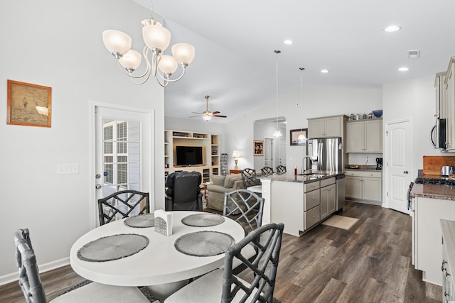 361 Rycola Cir, Myrtle Beach, SC 29575 - dining area with ceiling fan, dark wood finished floors, high vaulted ceiling, recessed lighting, and a chandelier