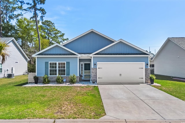 361 Rycola Cir, Myrtle Beach, SC 29575 - view of front of property with an attached garage, a front yard, stone siding, concrete driveway, and board and batten siding