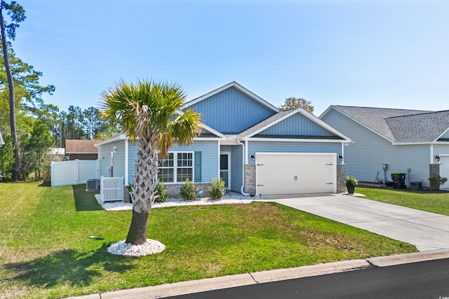361 Rycola Cir, Myrtle Beach, SC 29575 - view of front of house featuring a garage, concrete driveway, board and batten siding, and central air condition unit