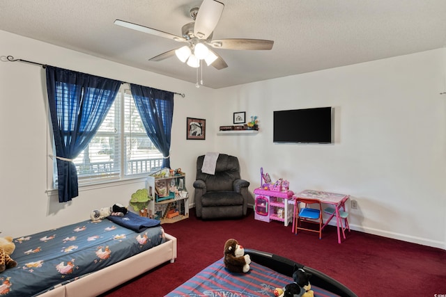 bedroom featuring a textured ceiling, ceiling fan, baseboards, and carpet floors