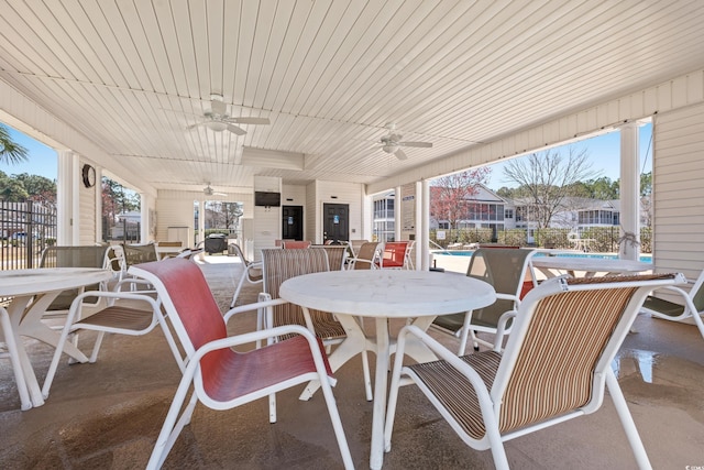 5022 Belleglen Ct Unit 202, Myrtle Beach, SC 29579 - view of patio with ceiling fan, outdoor dining space, and a community pool