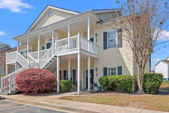 5022 Belleglen Ct Unit 202, Myrtle Beach, SC 29579 - view of front facade featuring covered porch and stairs