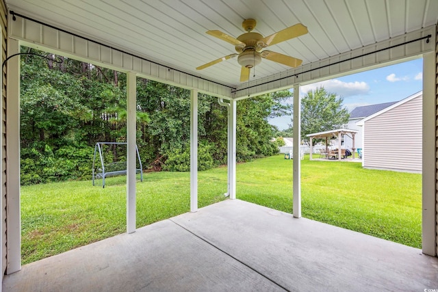 363 Junco Cir, Longs, SC 29568 - unfurnished sunroom with ceiling fan