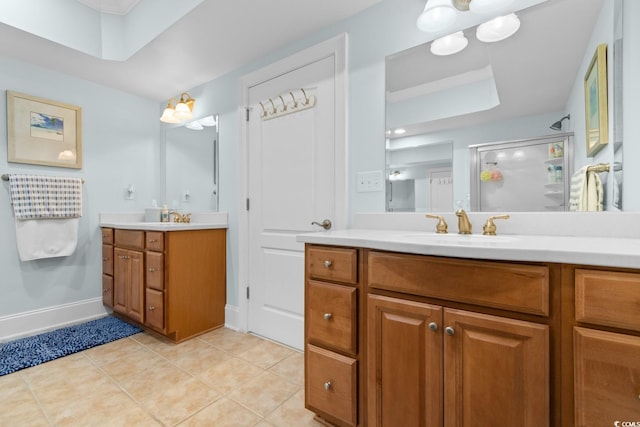 2180 Waterview Dr Unit 1024, North Myrtle Beach, SC 29582 - full bathroom with vanity, baseboards, a shower stall, tile patterned floors, and a skylight
