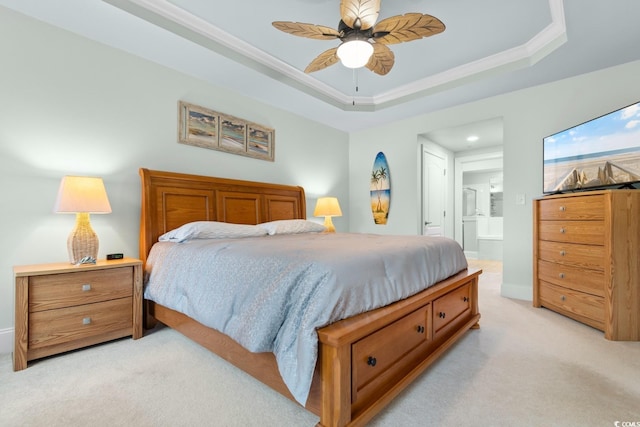 2180 Waterview Dr Unit 1024, North Myrtle Beach, SC 29582 - bedroom with light colored carpet, connected bathroom, ornamental molding, and a raised ceiling