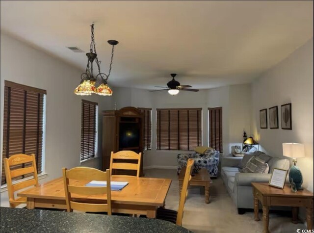dining room with ceiling fan