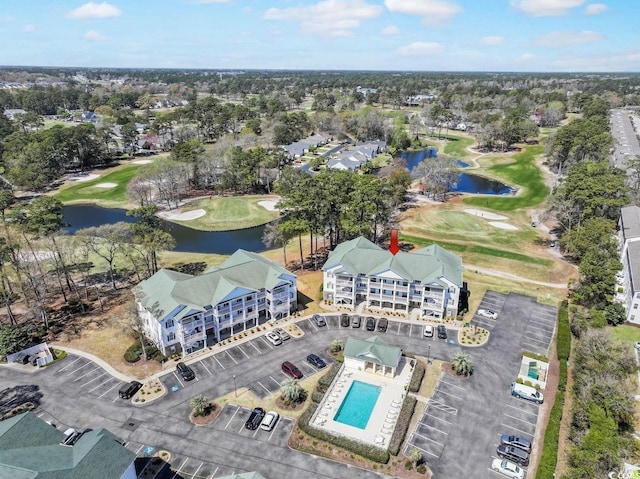 bird's eye view featuring a water view and golf course view