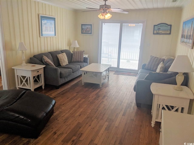 living room with wood-type flooring and ceiling fan