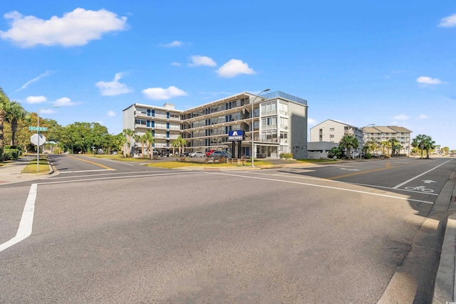 2010 S Ocean Blvd, Myrtle Beach, SC 29577 - view of apartment building / complex with uncovered parking