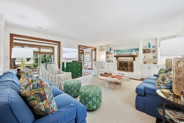 living area featuring built in shelves