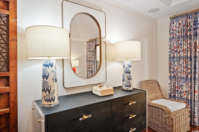 sitting room with ornamental molding