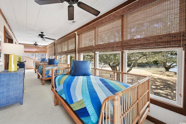 carpeted bedroom featuring wooden ceiling