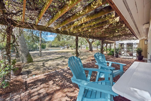 view of patio with a pergola and french doors