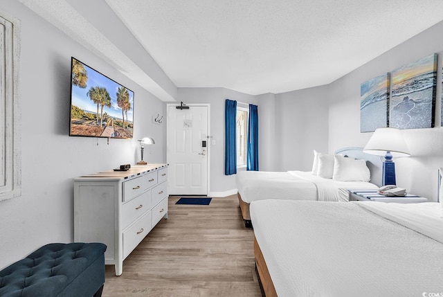 161 Sea Watch Dr Unit 614, Myrtle Beach, SC 29572 - bedroom with light wood finished floors and baseboards
