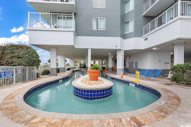161 Sea Watch Dr Unit 614, Myrtle Beach, SC 29572 - community pool with a patio