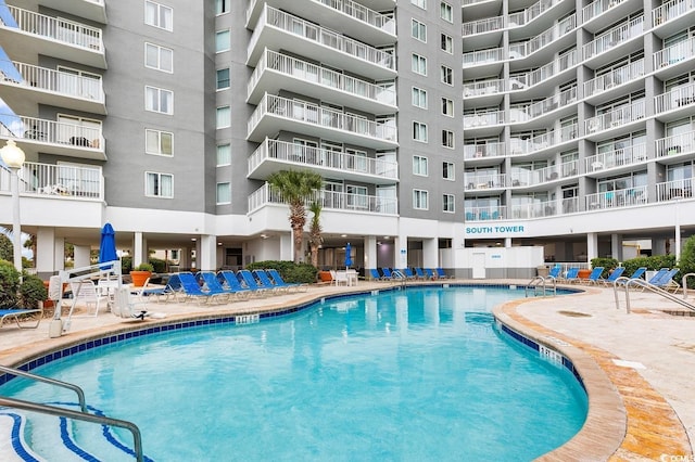 161 Sea Watch Dr Unit 614, Myrtle Beach, SC 29572 - community pool featuring a patio area